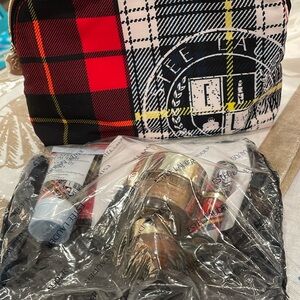 Estée Lauder make up and plaid cosmetics bag